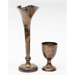 An egg cup with engraved initials London 1946, together with a fluted vase, with weighted base,