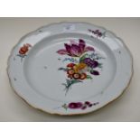 A large Meissen Marcolini period platter with a scalloped rim and gilt rim line,