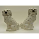 A pair of large Staffordshire flatback figures of spaniels (2)