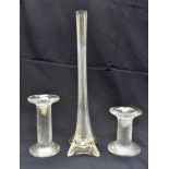 A pair of graduated late 20th Century Scandinavian style moulded glass candlesticks,