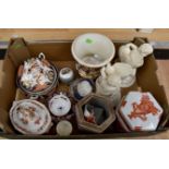 Pair of 19th Century cherub/fawns spill figures along with a pair of 19th Century storage jars,