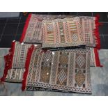 Five hand knotted Eastern origin rugs and runners. The two long runners measuring 183 cm and 200 cm.