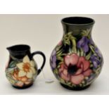 Two 21st Century boxed Moorcroft jug and vase,