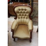 19th Century deep seated arm chair with gold button dralon