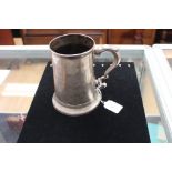 A George III silver mug, Newcastle 1786, hallmarked on the base underside, S scroll handle,