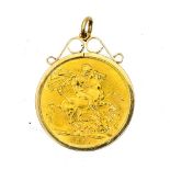A George V 22ct gold Sovereign, 1911, in a 9ct mount,