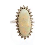 A precious opal and diamond marquise cluster 18ct white gold ring,