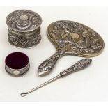 An early 20th Century Chinese Export silver dressing table set including large circular box and