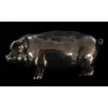 An Edwardian silver novelty pig pin cushion, Birmingham, circa 1910, marks rubbed, 0.