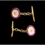 A pair of 18ct yellow gold chain cufflinks, circular fronts set with mother-of-pearl to centre,