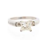 A diamond solitaire, claw set with a princess cut diamond,