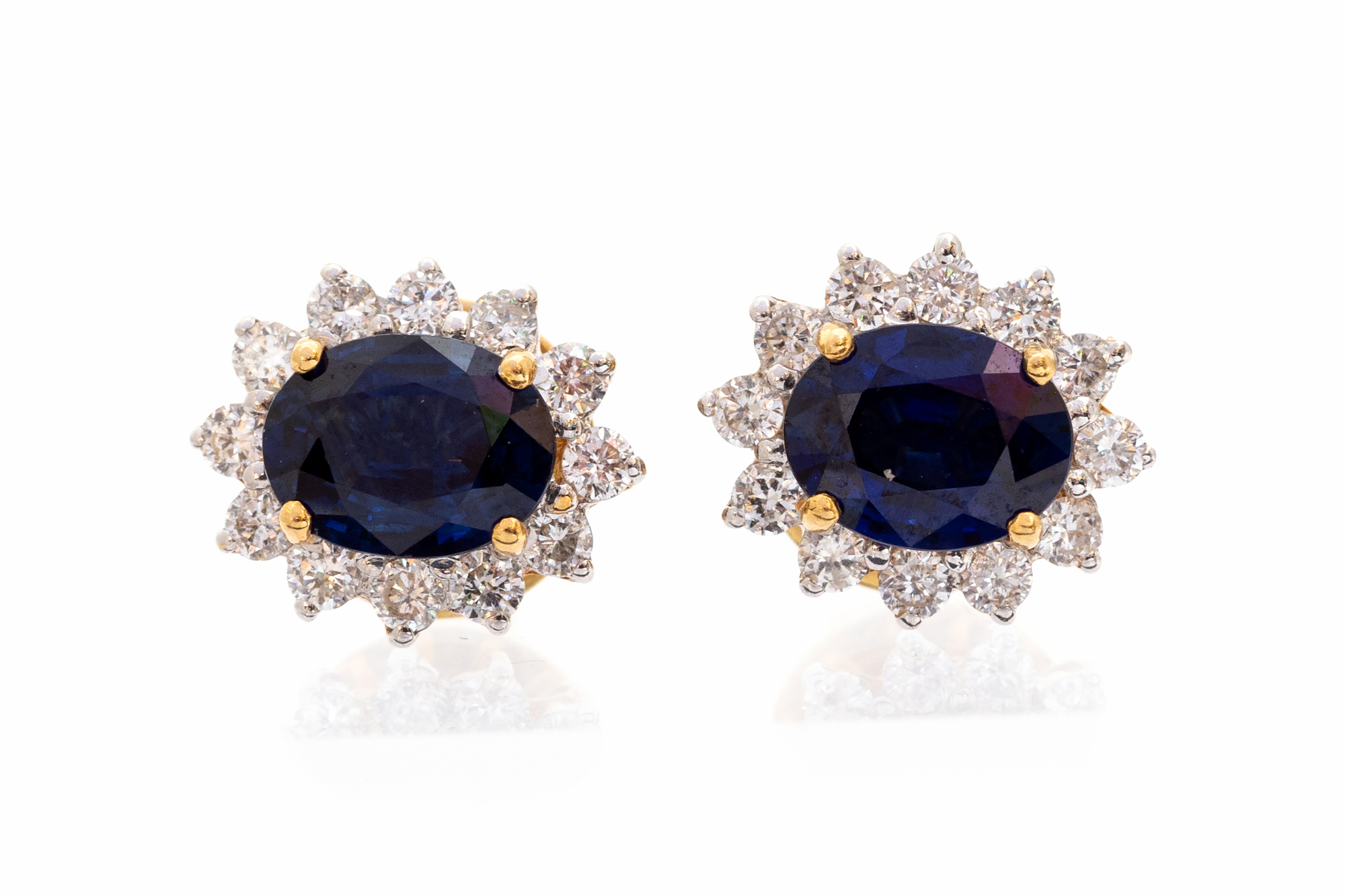 A pair of sapphire and diamond oval cluster yellow gold stud earrings,