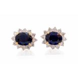 A pair of sapphire and diamond oval cluster yellow gold stud earrings,