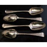 Four 18th Century silver Hanoverian spoons, each reverse handle engraved with a crest,
