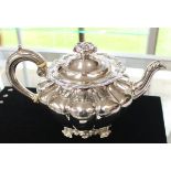 A William IV silver teapot,