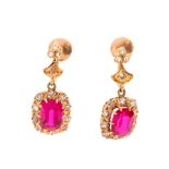 A pair of synthetic ruby and diamond cushion shaped drop cluster yellow gold earrings,