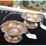 A pair of Edwardian silver swing handled miniature baskets, Birmingham 1901, with wirework handles,