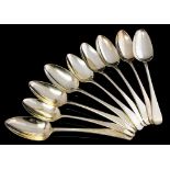 A collection of nine George III silver Old English Pattern table spoons, London,
