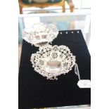 A pair of late Victorian William Comyns pierced silver bon bon dishes, cast foliate borders,