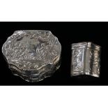 A Victorian silver cartouche shaped box and cover,