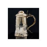 A George III silver lidded tankard, plain conical form with domed lid and pierced thumb piece,