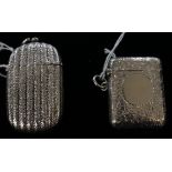 A Victorian silver vesta case, fluted with mottled decoration, suspension ring, Birmingham,