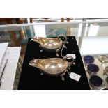 An Elizabeth II pair of silver sauce boats, Birmingham 1971, in the Georgian manner, reeded borders,