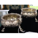 A matched pair of George III silver circular salts,