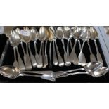 A collection of 19th Century silver fiddle pattern dessert spoons, various dates and makers, 31.