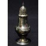 A George III Sterling silver baluster form caster on circular spreading foot,