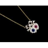 An Edwardian style diamond sapphire and ruby double-heart pendant,