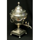 A George III silver tea urn, London 1792, of Neoclassical design, the cover with ball finial,
