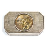 A Continental silver double hinged snuff box, gilt Cherub medallion to top lid,
