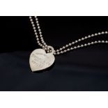 Tiffany & Co - a silver bead necklace, single or double row, with Tiffany heart disc, M90152,