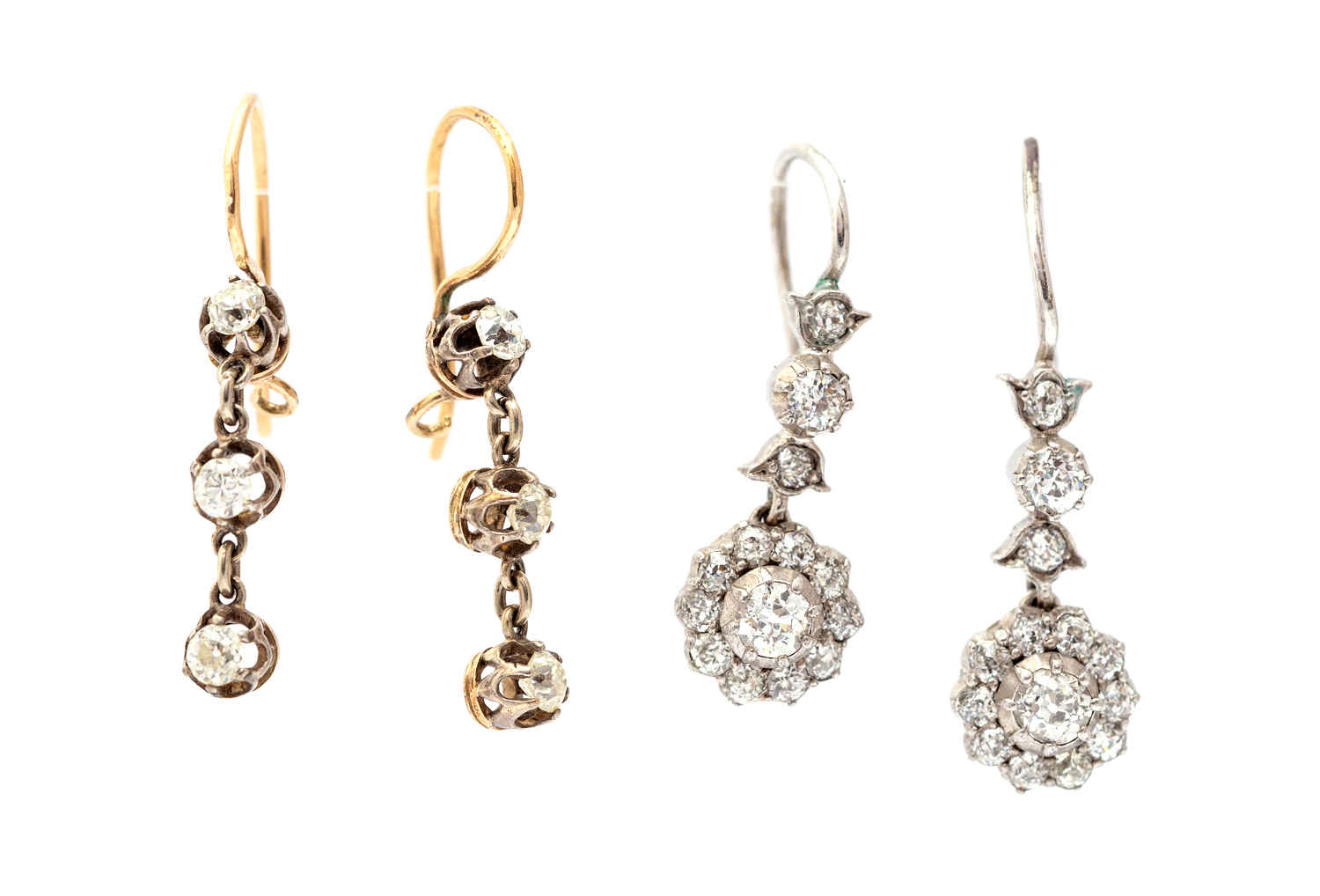A pair of Edwardian diamond and white metal drop earrings,
