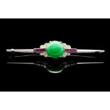 An Art Deco nephrite, ruby and diamond set 18ct white gold and platinum bar brooch,