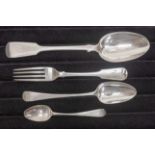 A collection of mainly 19th Century silver fiddle pattern dessert spoons,