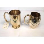 A Victorian barrel shaped silver mug, with gadroon lower section,