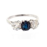 A sapphire and diamond three-stone platinum ring,
