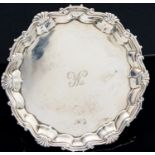 A George II silver card tray, London 1748, fluted scroll and shell border,