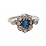 An Edwardian sapphire and diamond 18ct white gold cluster ring,
