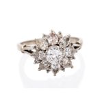 A diamond flower head cluster ring, the centre round brilliant-cut diamond approx 0.