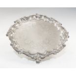 An early Victorian silver salver, the raised wavy border cast with leaf motifs,