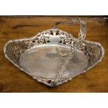 An Edwardian silver shaped oval pierced fruit basket,