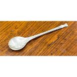 A modern silver Christmas seal spoon by Peter Jackson, the bowl with chased Ice Skater in relief,