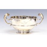A late Victorian large silver two-handled cup/punch bowl,