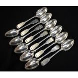 A set of eleven George IV Scottish sterling silver fiddle pattern tablespoons,