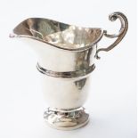 A Georgian style silver helmet shaped cream jug, makers marks for T Hill, Birmingham 1967, 3.