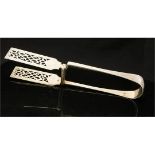 A pair of Victorian silver asparagus tongs, the blades with pierced decoration,