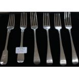 Four George III Old English Pattern silver table forks,
